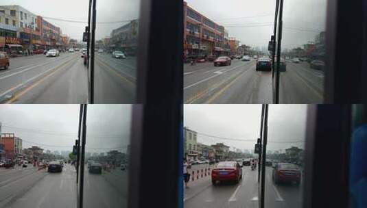 实拍小城市的公交车及车窗外景高清在线视频素材下载