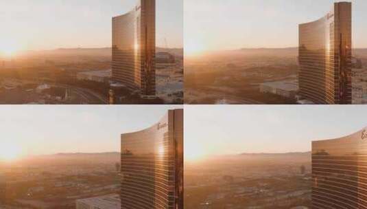 城市航拍日出阳光照射摩天大楼永利酒店高清在线视频素材下载
