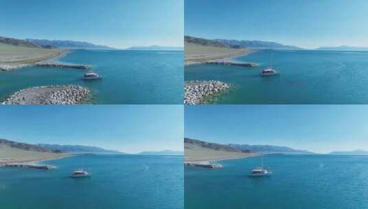 航拍湖面上行驶的帆船高清在线视频素材下载