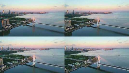 海南海口世纪大桥朝霞城市日出高视角航拍高清在线视频素材下载