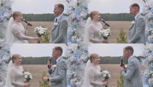 新娘和新郎在婚礼拱门前用麦克风宣誓高清在线视频素材下载