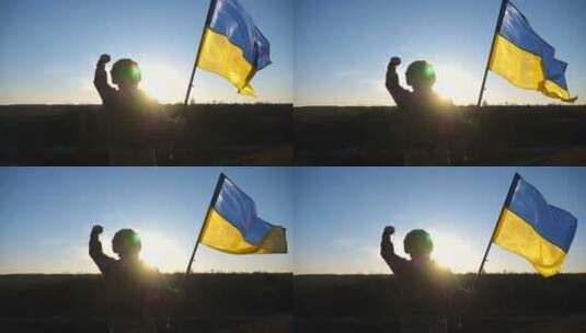 乌克兰军队士兵站在山上挥舞着乌克兰国旗高清在线视频素材下载