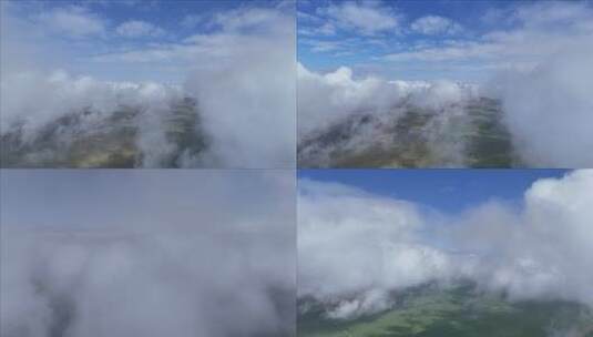 高空俯瞰云海与大地的壮丽景象高清在线视频素材下载