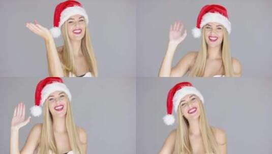戴圣诞帽打招呼的女孩高清在线视频素材下载