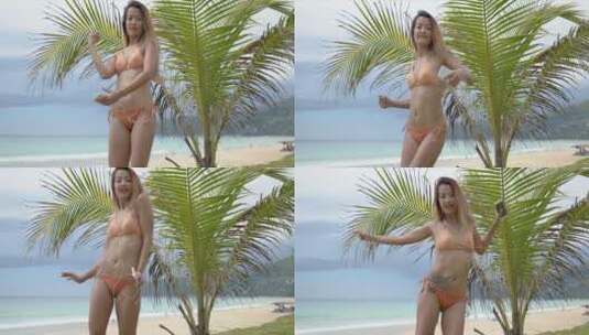 女人在海滩上跳舞高清在线视频素材下载