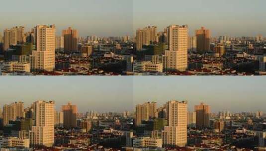 日落时分城市建筑群落高清在线视频素材下载
