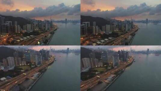海滨城市车水马龙夕阳云层航拍高清在线视频素材下载