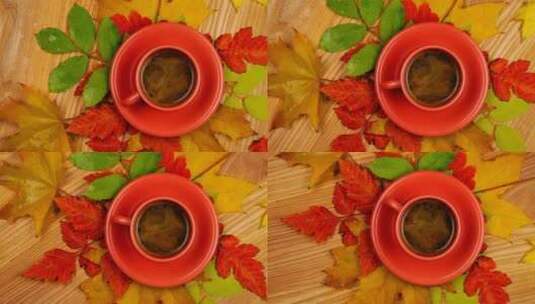 桌子上有橙色咖啡杯和秋叶高清在线视频素材下载