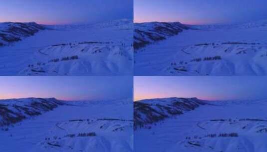 新疆阿勒泰雪山红色夕阳下的村落高清在线视频素材下载