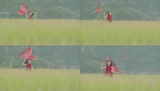 田地间放风筝的小女孩10高清在线视频素材下载