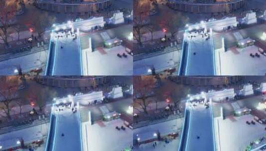 哈尔滨松花江上冬季冰雪游乐园高清在线视频素材下载