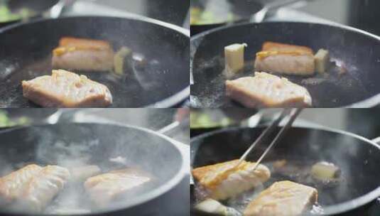 煎锅里的煎鱼特写镜头高清在线视频素材下载