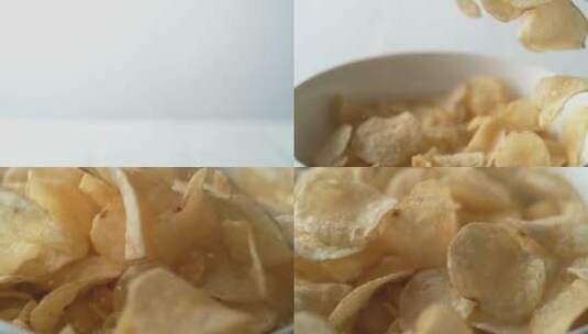 薯片落入碗中的慢镜头高清在线视频素材下载