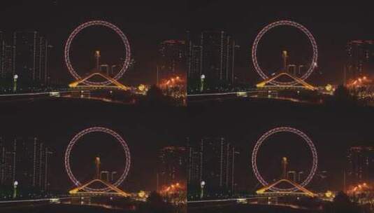 天津之眼夜景烟花著名旅游景点摩天轮永乐桥高清在线视频素材下载