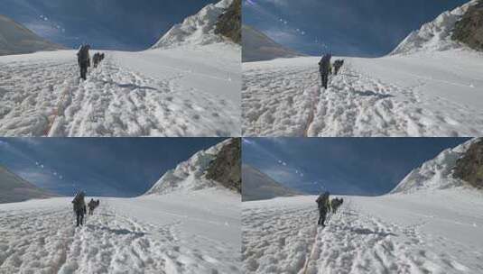 登山者攀爬雪坡高清在线视频素材下载