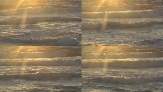 海洋日落和海滩上的海浪高清在线视频素材下载