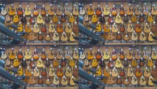 音乐器材商店货架上的吉他高清在线视频素材下载