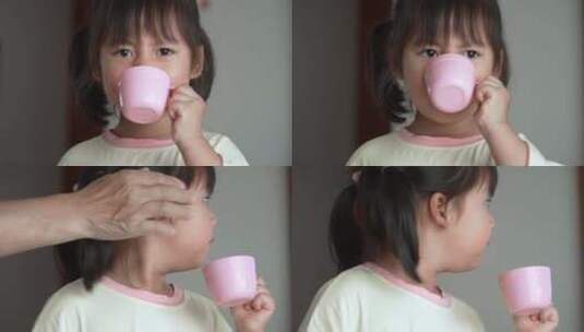 小女孩喝水高清在线视频素材下载