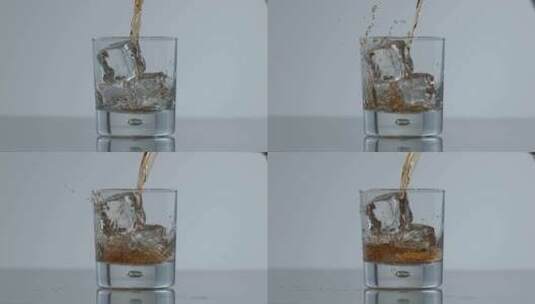 在有冰块的杯子里倒酒高清在线视频素材下载