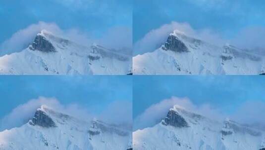 云在山顶雪地上漂移的时移。高清在线视频素材下载
