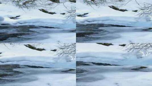 积雪下的溪流高清在线视频素材下载