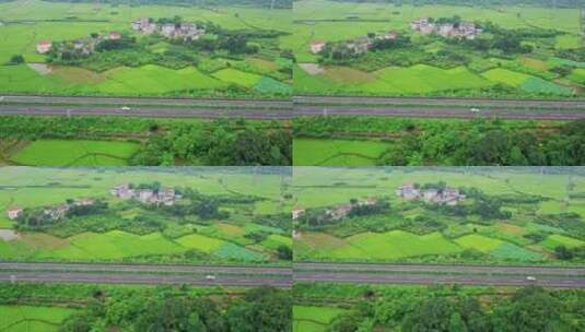高速公路穿过美丽乡村绿色田野高清在线视频素材下载
