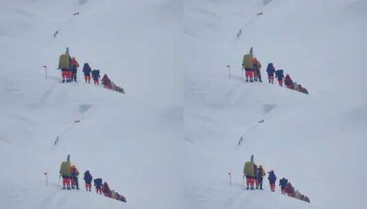 攀登冰川之父慕士塔格峰雪山的登山队队员高清在线视频素材下载