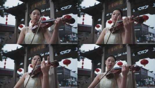 美女在无锡南长街拉小提琴高清在线视频素材下载