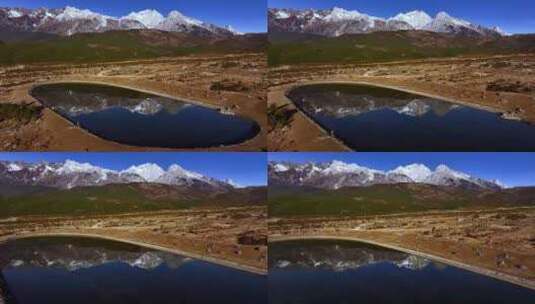玉龙雪山和湖泊水面的雪山倒影高清在线视频素材下载