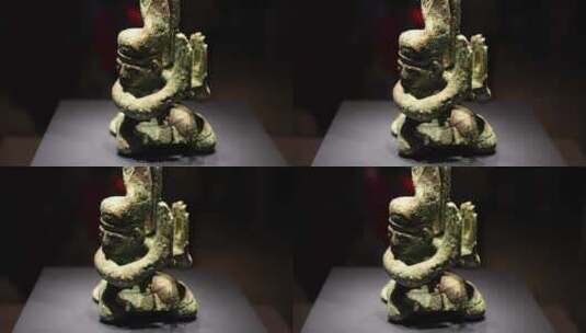 三星堆青铜人商代晚期长发青铜跪坐人像高清在线视频素材下载