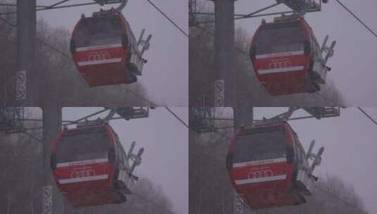 慢镜头长焦云顶滑雪场缆车下雪天高清在线视频素材下载