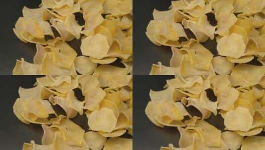 4K晒干了的美食土豆马铃薯片高清在线视频素材下载
