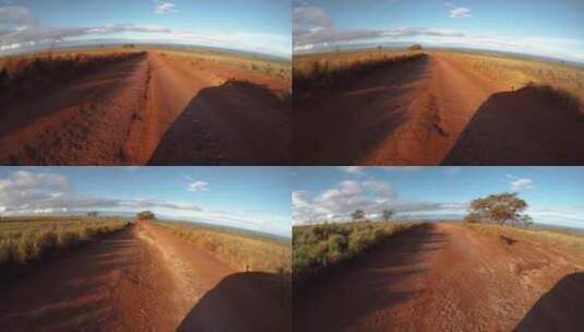开车行驶在一条土路上的镜头高清在线视频素材下载