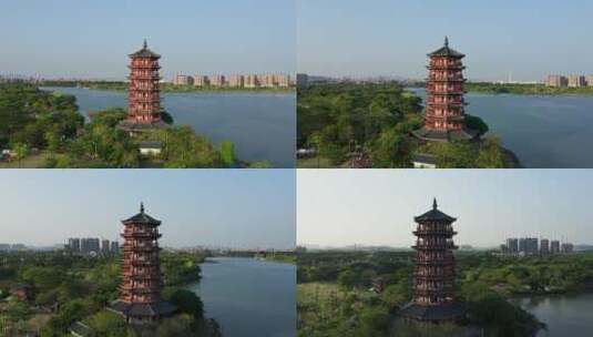 东莞航拍华阳湖湿地公园华阳塔前进拉升环绕高清在线视频素材下载