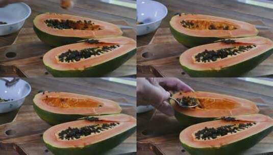用勺子清洗木瓜种子特写高清在线视频素材下载