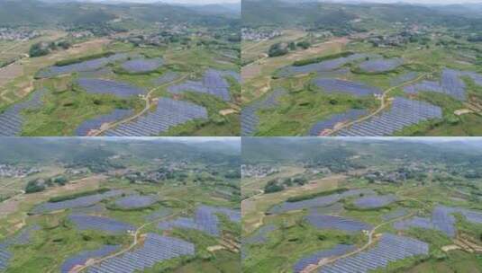 山坡上的太阳能电站航拍视频高清在线视频素材下载