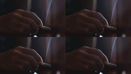 手指夹着香烟的男人高清在线视频素材下载