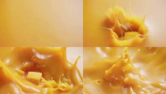 芒果粒落入芒果汁慢镜头高清在线视频素材下载
