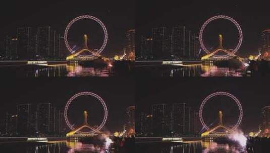 天津之眼夜景烟花著名旅游景点摩天轮永乐桥高清在线视频素材下载