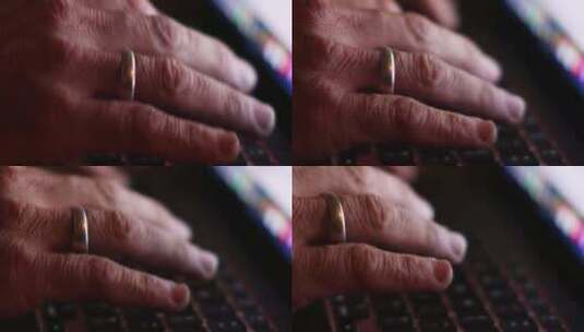 一名男子双手在屏幕背光的笔记本电脑上打字的特写镜头高清在线视频素材下载