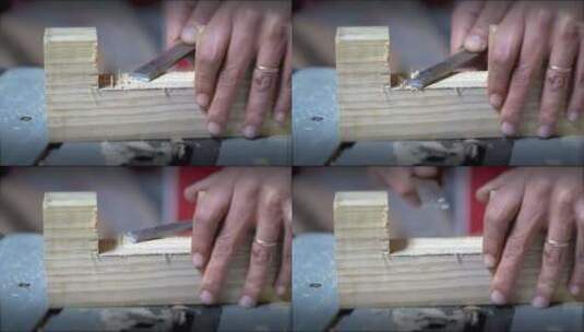 木匠用凿子刻木头高清在线视频素材下载