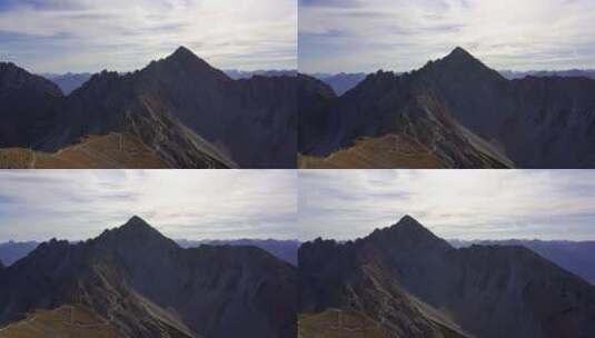 在阿尔卑斯山脉拍摄的平移照片显示了Seefelderspitze nea的ReitherSpitze山峰高清在线视频素材下载