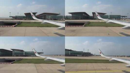 飞机在北京首都国际机场跑道滑行高清在线视频素材下载