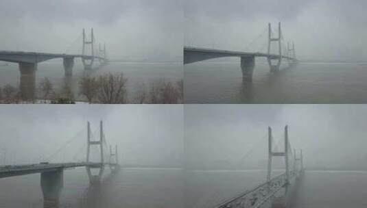 航拍武汉长江二桥冬天下雪俯拍远景高清在线视频素材下载