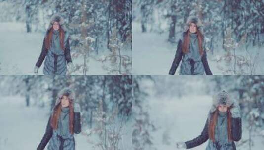 美丽的女人在雪地里行走高清在线视频素材下载