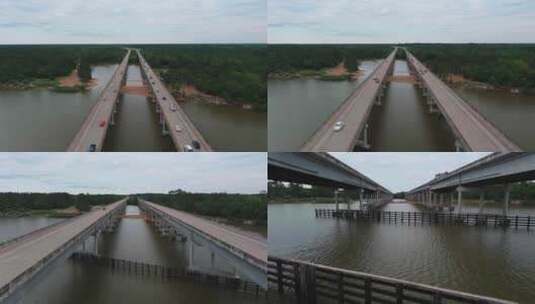 德克萨斯州休斯顿圣哈辛托河大桥上行驶的汽车天线高清在线视频素材下载
