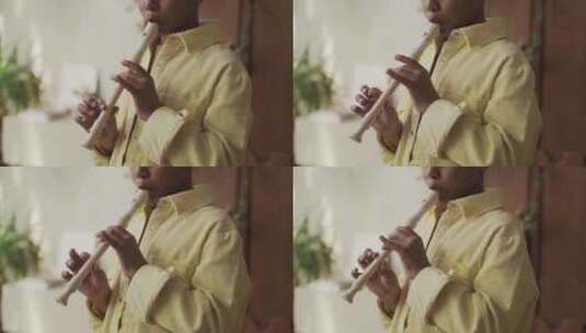 男孩用长笛高清在线视频素材下载