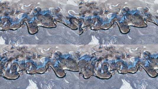 航拍冬季雪原湿地蜿蜒河流高清在线视频素材下载