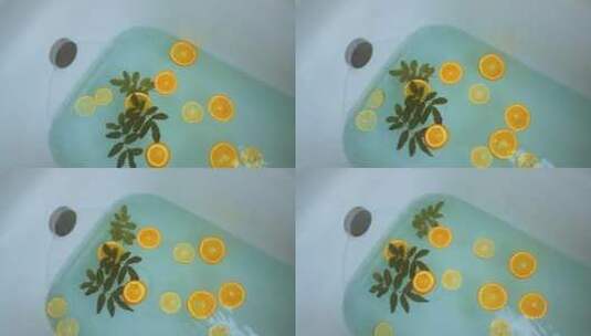 浴缸中飘浮着的柠檬片高清在线视频素材下载