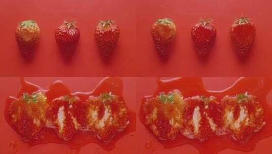 4K三颗草莓被挤压高清在线视频素材下载